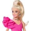 Mattel Barbie Deluxe Style baba elegáns rózsaszín ruhában