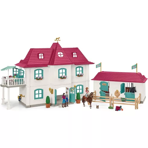 Schleich 42551 Lakóház istállóval és lovakkal