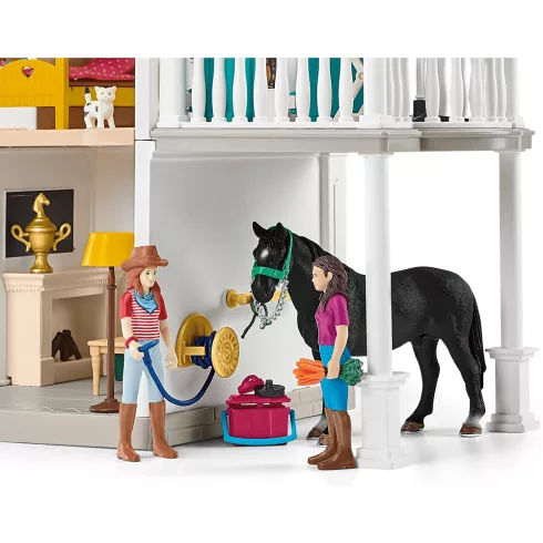 Schleich 42551 Lakóház istállóval és lovakkal