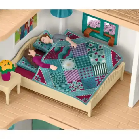 Schleich 42706 Hannah családi háza lovardával és lovakkal